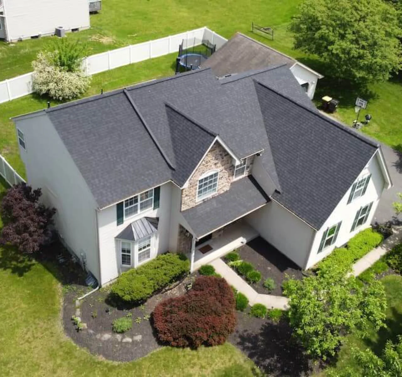 Professional roofing team working on a premium roofing project